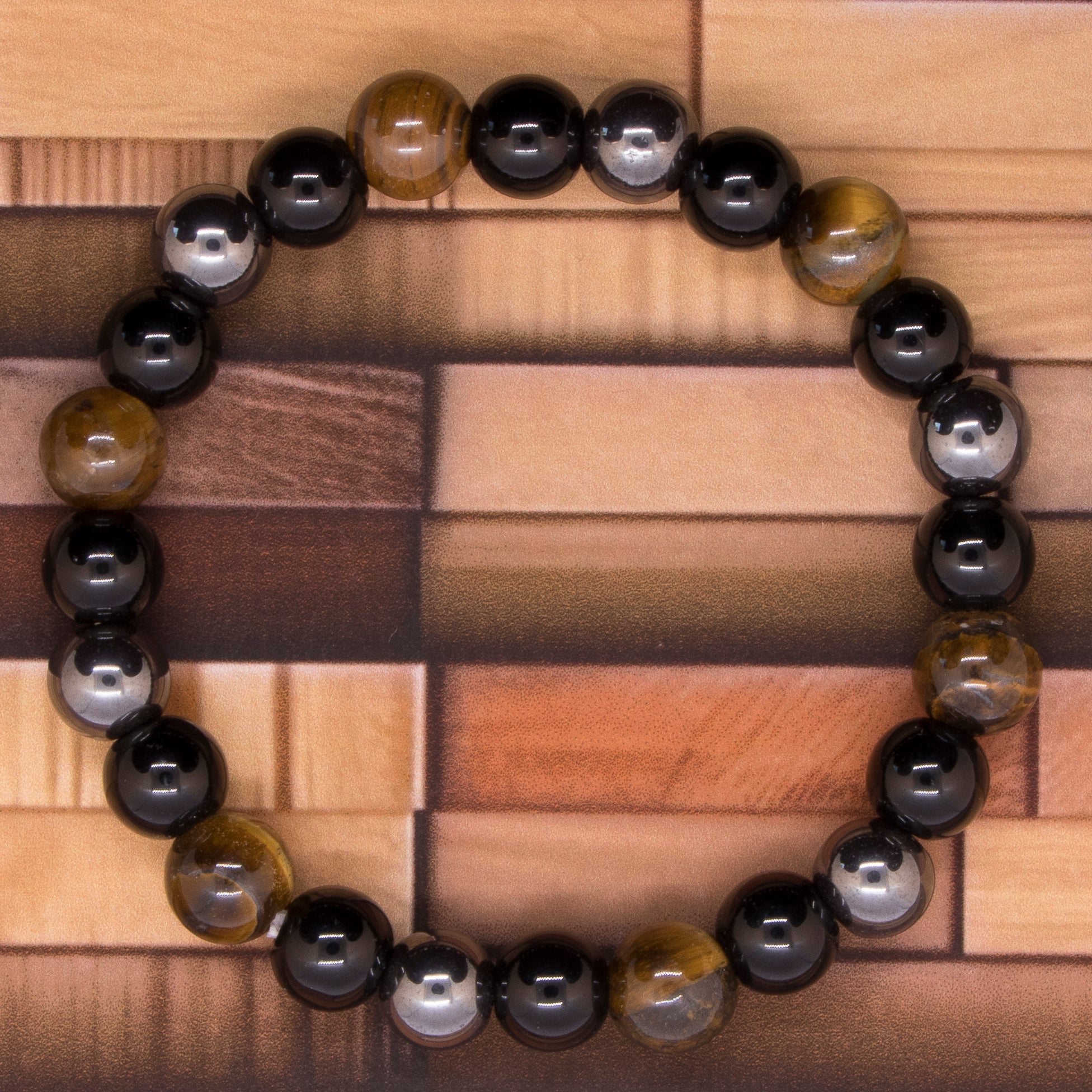 Pulsera de ojo de tigre, hematita y obsidiana